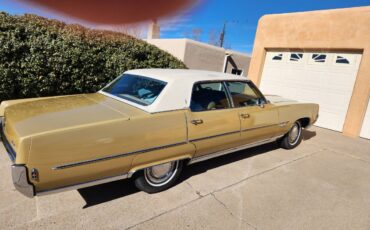 Oldsmobile-98-luxury-sedan-1969-yellow-180317-2