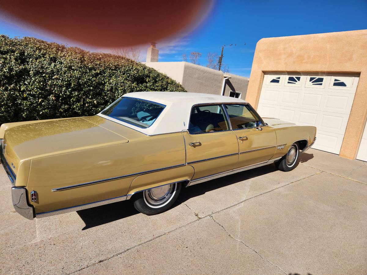 Oldsmobile-98-luxury-sedan-1969-yellow-180317-2