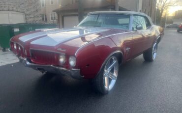 Oldsmobile-Cutlass-1969-red-73225-1