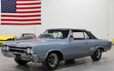 Oldsmobile-Cutlass-Cabriolet-1965-Sheffield-Mist-Poly-Black-37659-1