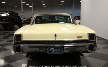 Oldsmobile-Cutlass-Coupe-1967-White-Black-146404-10