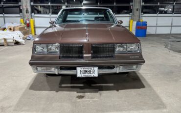 Oldsmobile-Cutlass-supreme-1983-brown-183524-1