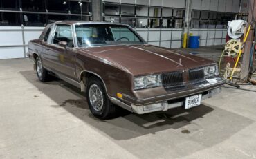 Oldsmobile-Cutlass-supreme-1983-brown-183524-2