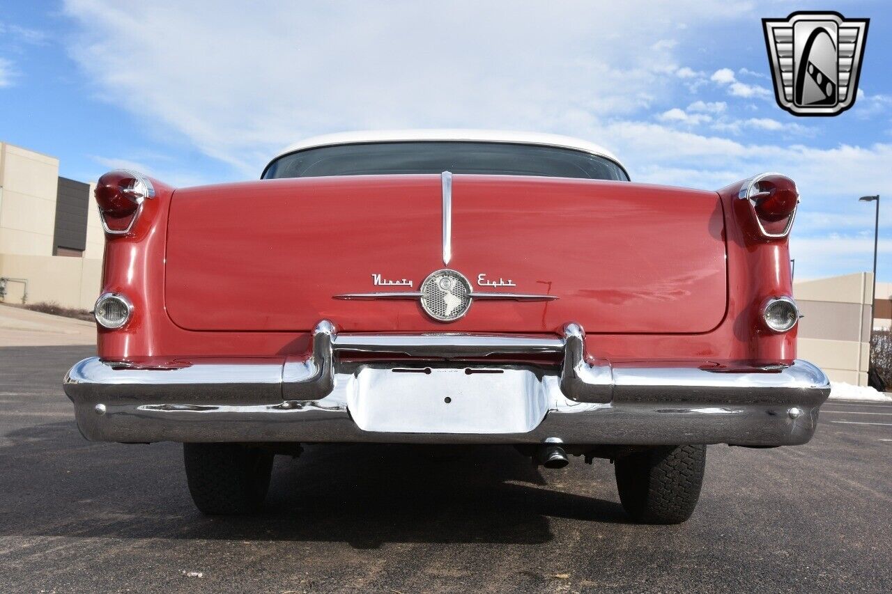 Oldsmobile-Ninety-Eight-1955-Red-Green-136299-5