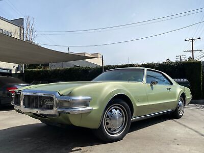 Oldsmobile-Toronado-Coupe-1969-Green-White-163596-1