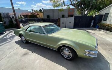 Oldsmobile-Toronado-Coupe-1969-Green-White-163596-4