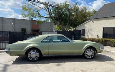 Oldsmobile-Toronado-Coupe-1969-Green-White-163596-5