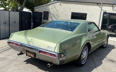 Oldsmobile-Toronado-Coupe-1969-Green-White-163596-7