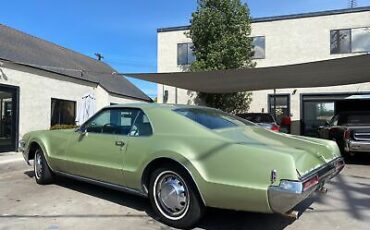 Oldsmobile-Toronado-Coupe-1969-Green-White-163596-8