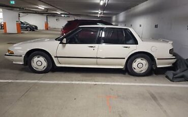 Pontiac-Bonneville-Berline-1989-White-Gray-151278-1