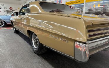 Pontiac-Grand-Prix-1967-Gold-Black-0-26