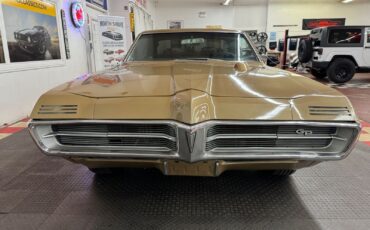 Pontiac-Grand-Prix-1967-Gold-Black-0-6