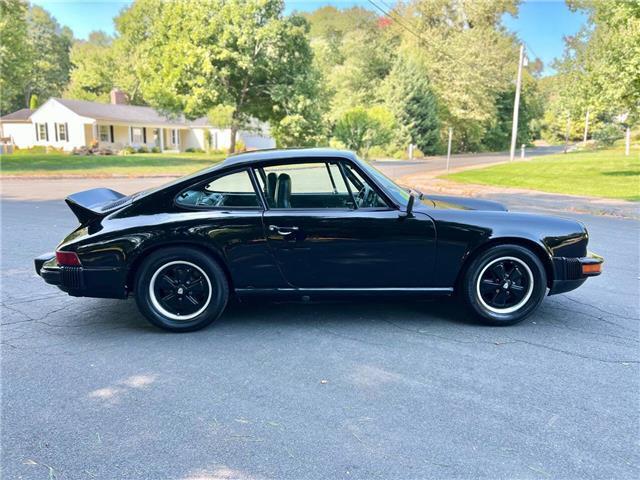 Porsche-911S-Coupe-Sunroof-1975-Black-Black-131042-11