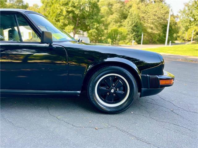 Porsche-911S-Coupe-Sunroof-1975-Black-Black-131042-12