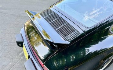 Porsche-911S-Coupe-Sunroof-1975-Black-Black-131042-14