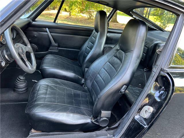 Porsche-911S-Coupe-Sunroof-1975-Black-Black-131042-17