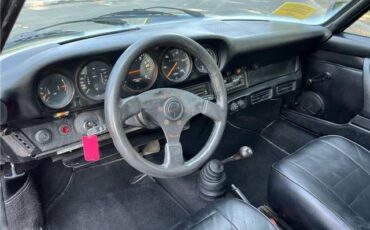 Porsche-911S-Coupe-Sunroof-1975-Black-Black-131042-18