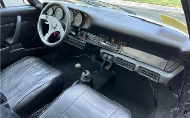 Porsche-911S-Coupe-Sunroof-1975-Black-Black-131042-22