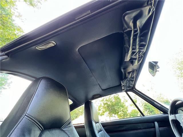 Porsche-911S-Coupe-Sunroof-1975-Black-Black-131042-23