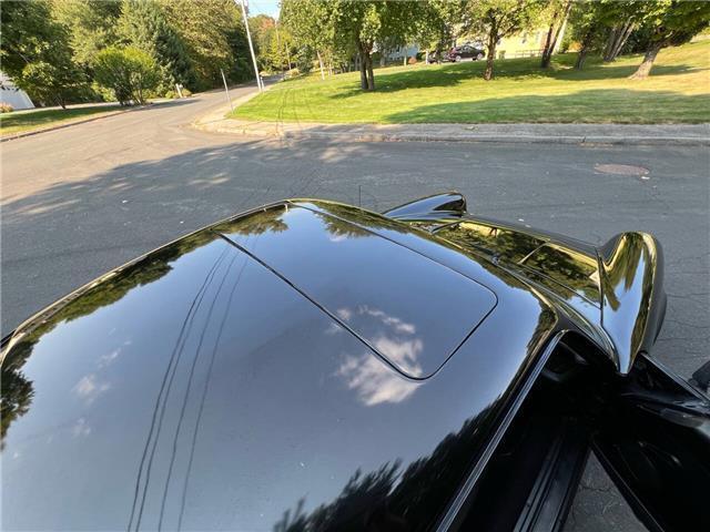 Porsche-911S-Coupe-Sunroof-1975-Black-Black-131042-24