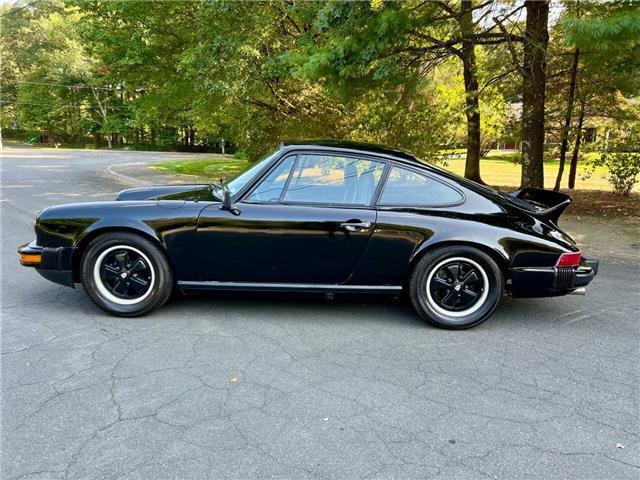 Porsche-911S-Coupe-Sunroof-1975-Black-Black-131042-3