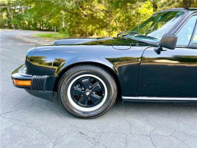 Porsche-911S-Coupe-Sunroof-1975-Black-Black-131042-4