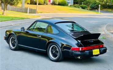 Porsche-911S-Coupe-Sunroof-1975-Black-Black-131042-7