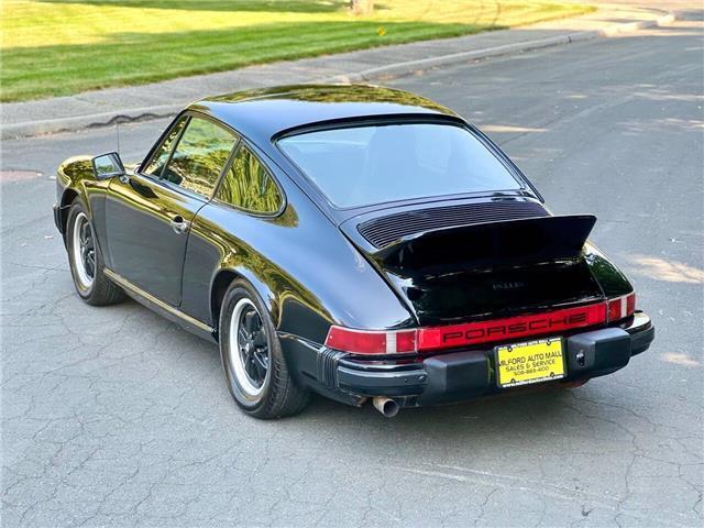 Porsche-911S-Coupe-Sunroof-1975-Black-Black-131042-8