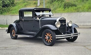 Studebaker-2-DOOR-COUPE-Coupe-1930-Black-Brown-116510-3