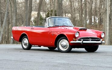 Sunbeam-Tiger-Mk1-a-1965-Red-Black-32391-1