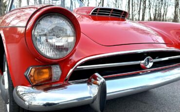 Sunbeam-Tiger-Mk1-a-1965-Red-Black-32391-18