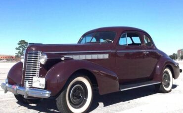 Buick-40-Special-Coupe-1938-Burgundy-Tan-161