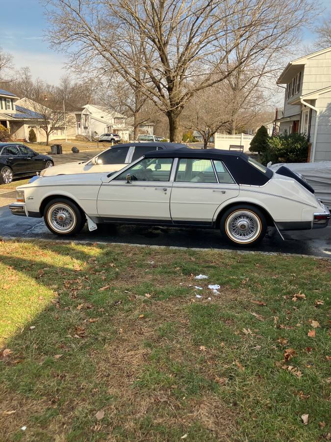 Cadillac-Seville-1985-white-116610-1