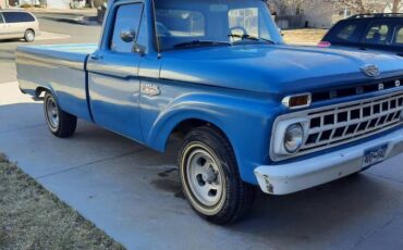 Ford-F100-pickup-1965-blue-27359