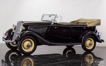 Ford-Model-40-Deluxe-Phaeton-1934-Black-Brown-Leather-0-1