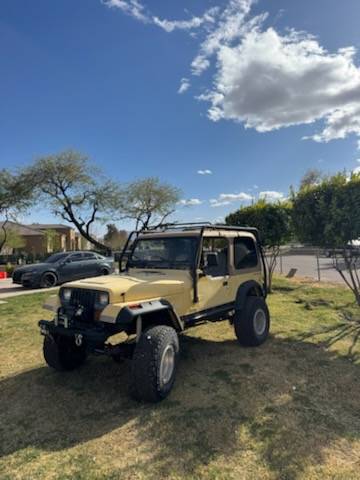 Jeep-Wrangler-1992-yellow-302556