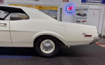 Mercury-Comet-Coupe-1968-White-Champagne-27990-20