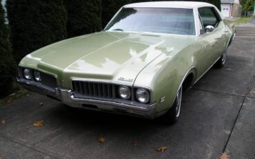 Oldsmobile-Cutlass-1969-green-167371