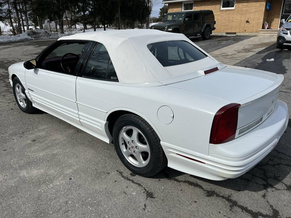 Oldsmobile-Cutlass-supreme-1994-white-71369-6