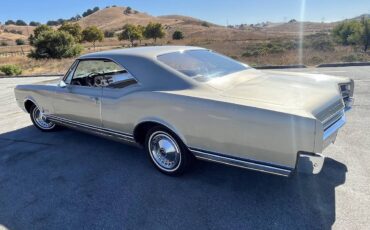 Oldsmobile-Delta-88-holiday-coupe-1965-silver-29773-1