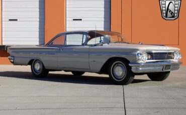 Pontiac-Bonneville-1960-Shell-Tone-Ivory-Red-94227-8